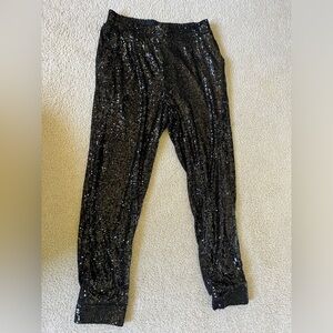BB Dakota, women’s black sequin skinny pants in size medium.
